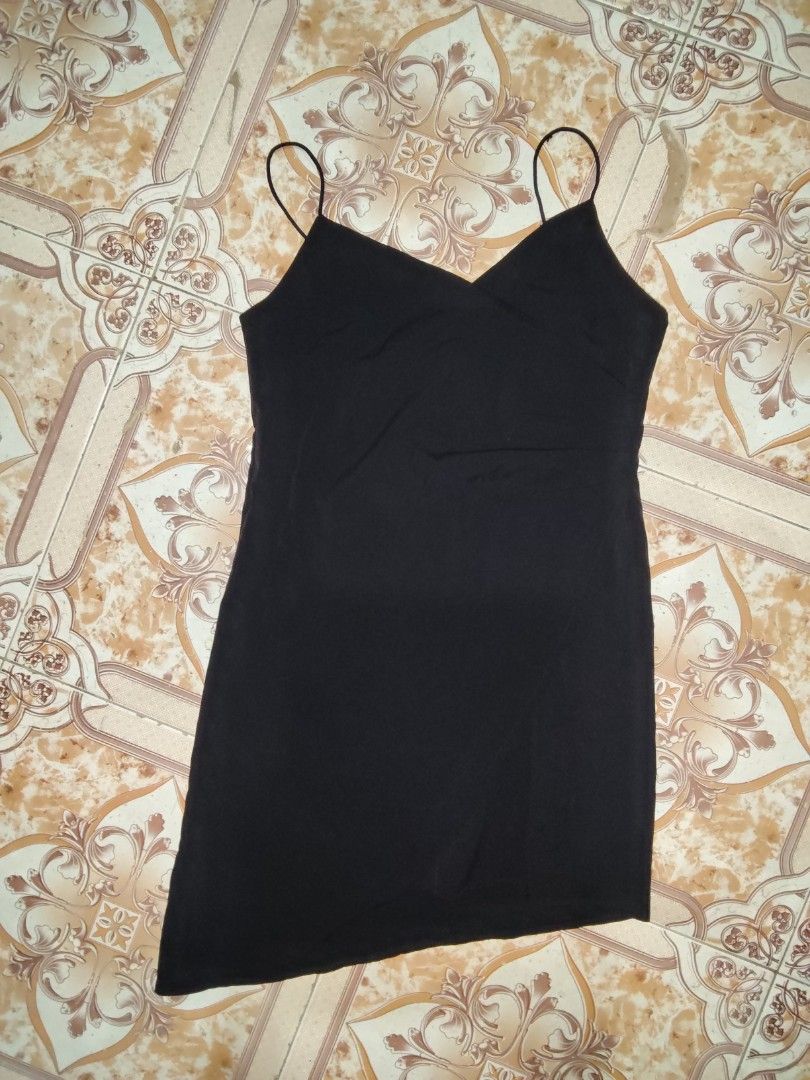 Black Spaghetti Strap Mini Dress (Category: Dresses) located in Manila. Submitted by chocobutternut_ (Listing ID 1463072359, Image 2). Description: - Black mini dress - Spaghetti straps - V-neckline - Asymmetrical hemline - Back zipper closure - Simple, chic, and versatile.
