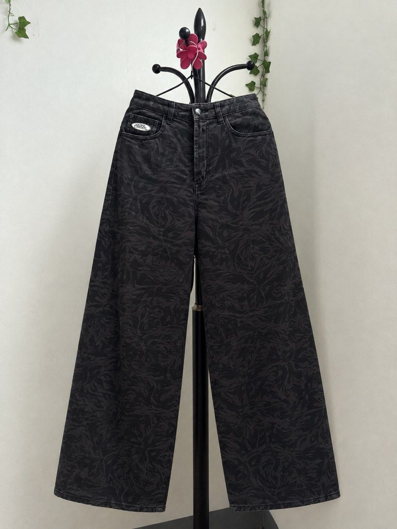 Black Wide Leg Jeans with Abstract Pattern (Category: Jeans) located in Manila. Submitted by _noname.shop (Listing ID 1462951621, Image 1). Description: - Cool black wide leg jeans - Unique abstract pattern all over - High-waisted fit - Button and zip closure - Pockets in the front and back - Great for a casual look.