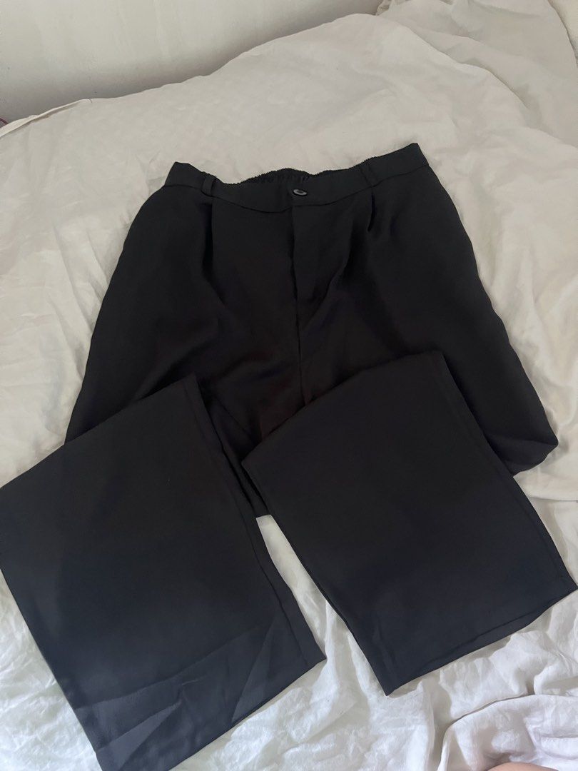 Black Wide Leg Slacks Pants Size Plussize (Category: Other Bottoms) located in Manila. Submitted by happydani (Listing ID 1462951276, Image 2). Description: - 4XL - Stylish black culottes - Wide leg design - Comfortable elastic waistband at the back - Features convenient pockets - Versatile for casual or dressed-up looks - Easy to pair with any top - Washing instructions available on tag.