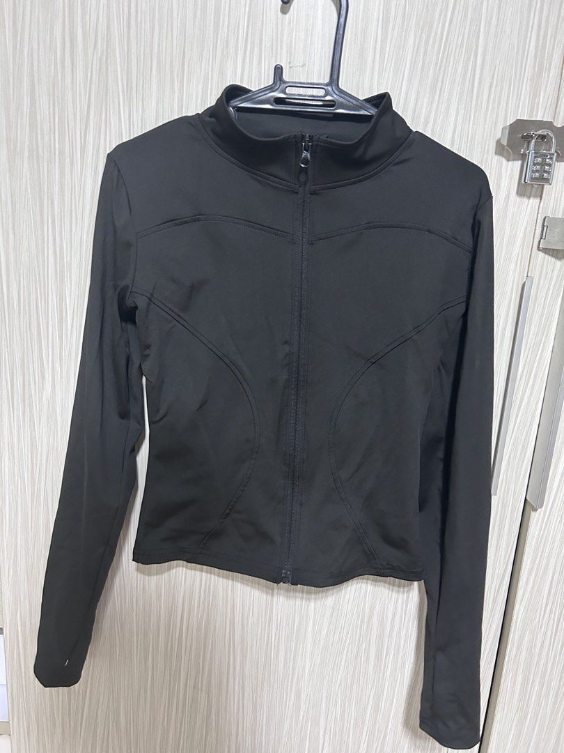 Black Zip-Up Activewear Jacket with Thumbholes (Category: Activewear) located in Manila. Submitted by juvy13 (Listing ID 1463014517, Image 1). Description: - Black zip-up jacket - Long sleeves with thumbholes - Comfortable and stretchy material - Snug fit - Ideal for workouts, casual wear, or layering for outdoor activities like hiking.