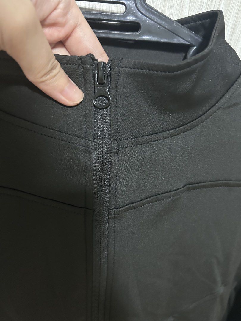 Black Zip-Up Activewear Jacket with Thumbholes (Category: Activewear) located in Manila. Submitted by juvy13 (Listing ID 1463014517, Image 2). Description: - Black zip-up jacket - Long sleeves with thumbholes - Comfortable and stretchy material - Snug fit - Ideal for workouts, casual wear, or layering for outdoor activities like hiking.