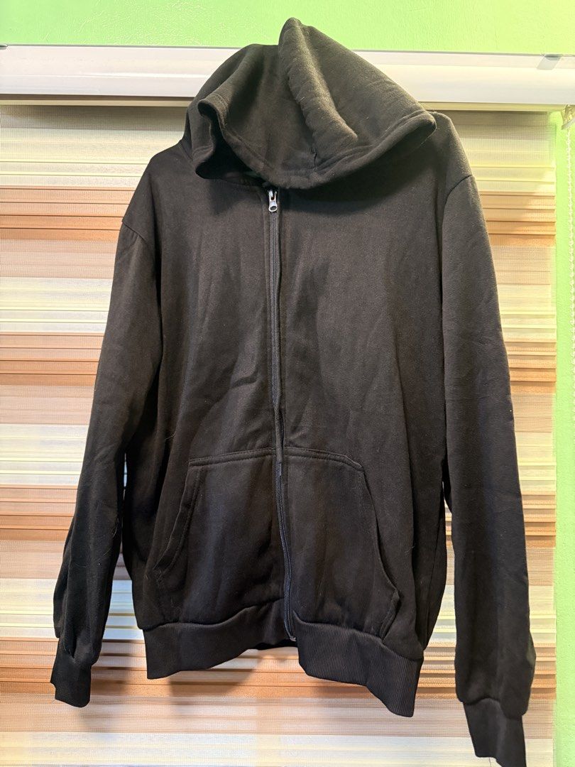 Black Zip-Up Hoodie (Category: Hoodies) located in Caloocan City. Submitted by johnpaulj (Listing ID 1462920750, Image 1). Description: SIZES: A = 26 inches B= 21 inches - Classic black zip-up hoodie - Full front zipper closure - Two convenient front pockets - Ribbed cuffs and hem for a snug fit - Versatile for layering or casual outfits - Effortlessly pairs with any wardrobe.