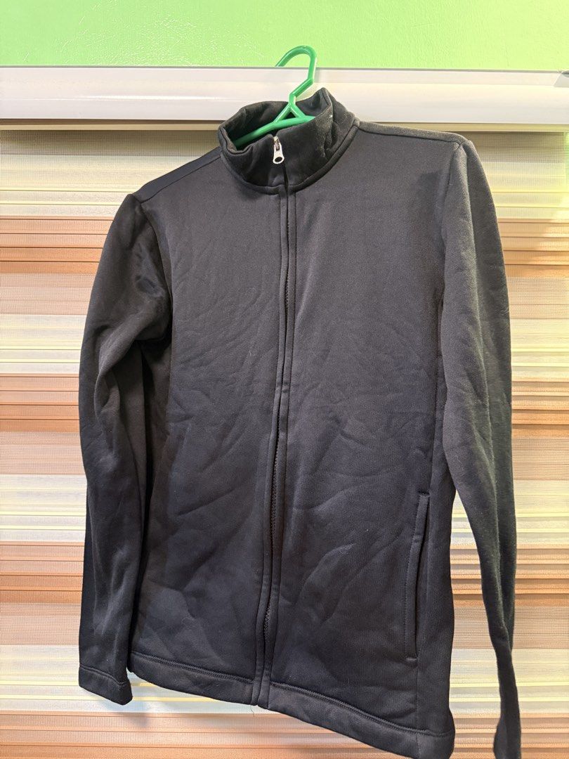 Black Zip-Up Track Jacket (Category: Coats, Jackets and Outerwear) located in Caloocan City. Submitted by johnpaulj (Listing ID 1462925223, Image 1). Description: SIZES: A = 24 Inches B = 20 Inches - Classic black zip-up jacket - Features a stylish stand-up collar - Two convenient side pockets - Comfortable ribbed cuffs and hem - Ideal for everyday casual wear - Great for layering over other outfits - Easy to wear and remove.