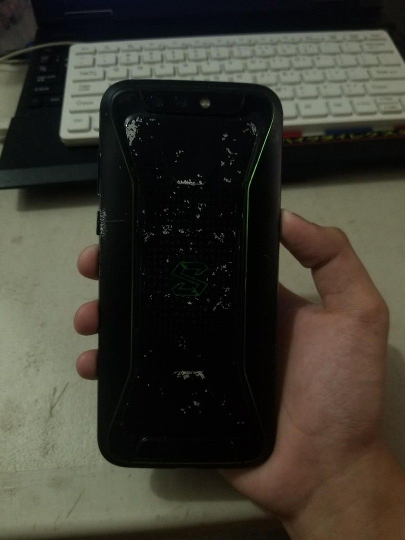 Blackshark 1 (Category: Samsung) located in Bulacan. Submitted by johnjavierzx (Listing ID 1462993108, Image 2). Description: Blackshark 1 Unit and case only Good for gaming 6gb ram snapdragon 845 Honest Issue: scratches & dents tas paint chips sa back(kita naman sa pic), sira ang home button Bulacan loc Meetup only.