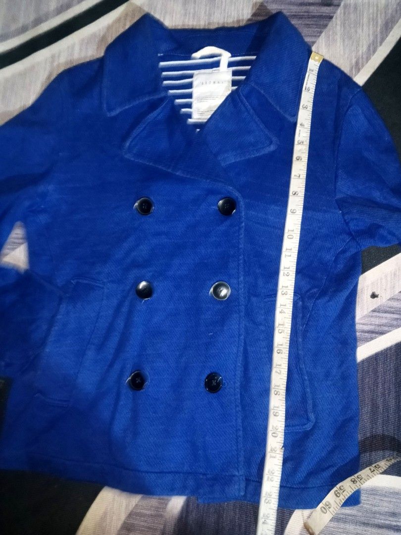 Blue Double-Breasted Peacoat with Striped Lining (Category: Coats, Jackets and Outerwear) located in Manila. Submitted by icamalicdem29 (Listing ID 1463091208, Image 3). Description: - Cool blue peacoat - Double-breasted with black buttons - Fun blue and white striped lining - Ideal for cooler weather - Sharp and stylish look - Measurements available upon request - Feel free to ask questions!.