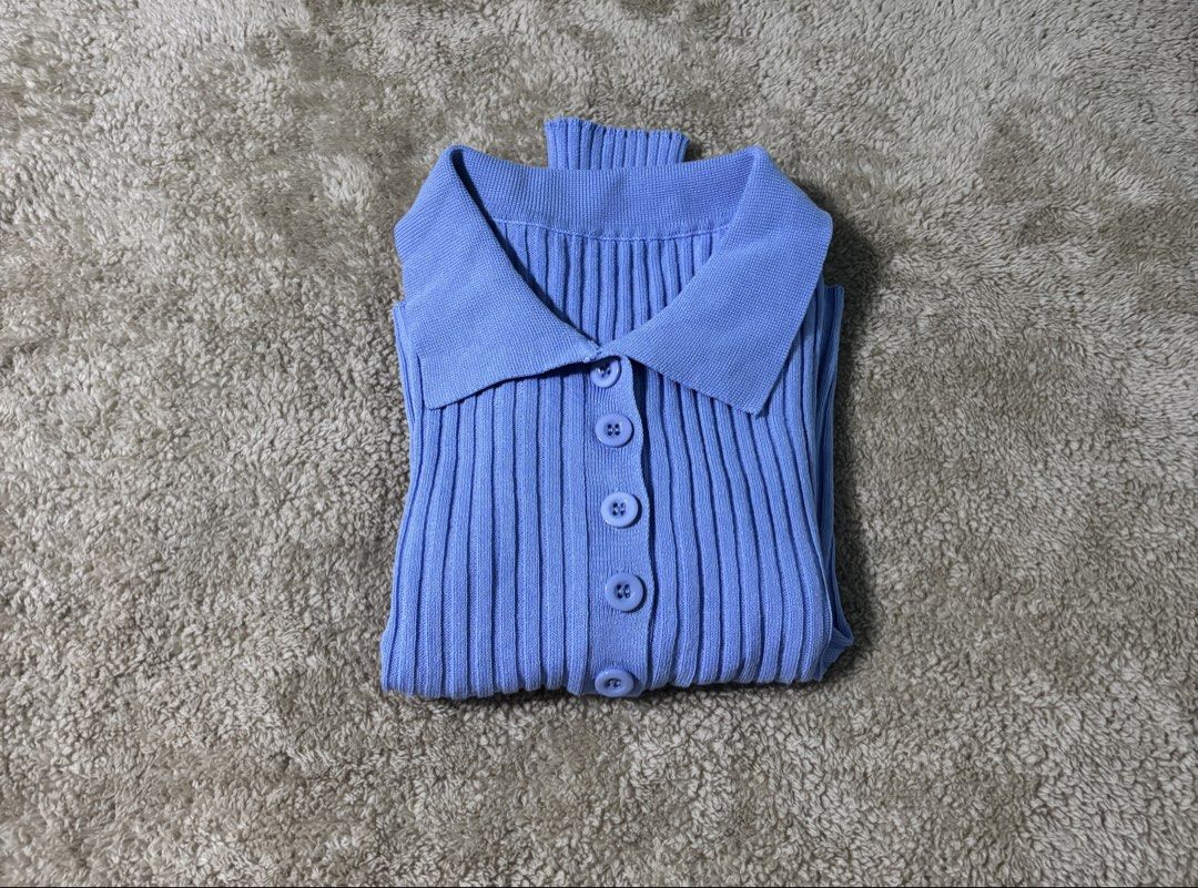 Blue Knitted Polo Long Sleeve Top (Category: Longsleeves) located in Las Pinas. Submitted by leleqt_ (Listing ID 1463061665, Image 2). Description: - Knitted top - Long sleeves - Classic polo collar - Button-up front closure - Stretchy material for comfort - Looks great tucked in or worn out - Perfect versatile addition to your wardrobe - Size Small.