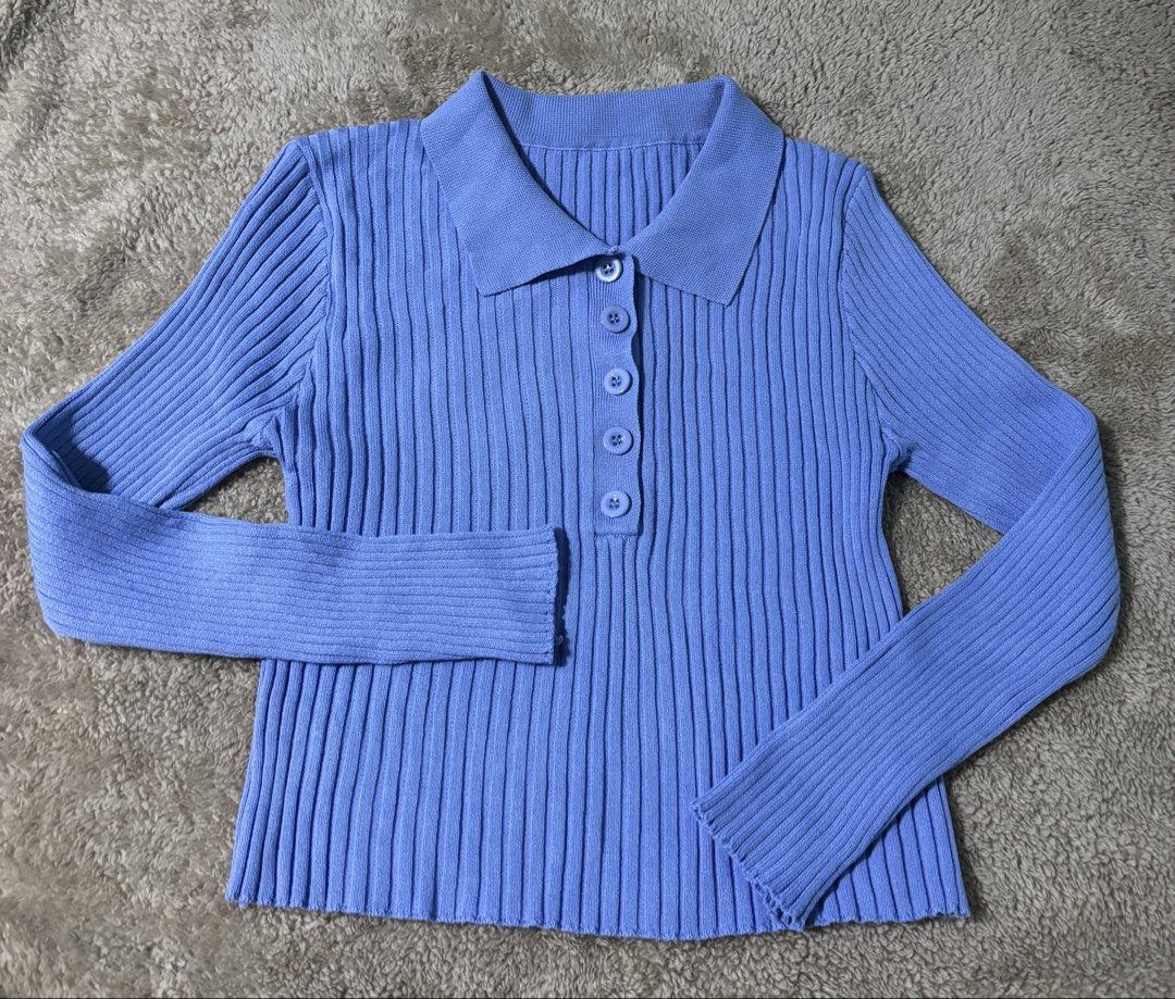Blue Knitted Polo Long Sleeve Top (Category: Longsleeves) located in Las Pinas. Submitted by leleqt_ (Listing ID 1463061665, Image 1). Description: - Knitted top - Long sleeves - Classic polo collar - Button-up front closure - Stretchy material for comfort - Looks great tucked in or worn out - Perfect versatile addition to your wardrobe - Size Small.