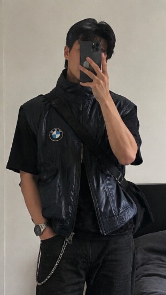 BMW Padded Vest Sleeveless Jacket (Category: Coats, Jackets and Outerwear) located in Manila. Submitted by cheezynutzyfriez (Listing ID 1462976967, Image 1). Description: - Cool BMW vest - Dark navy blue color - Zip closure - Front pockets - Ribbed hem - Great for layering over t-shirts or hoodies - Perfect for casual wear.