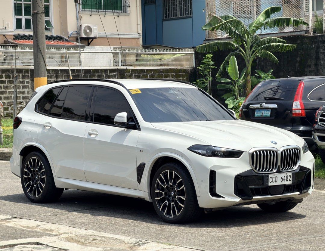 BMW X5 xDrive3.0D Msport Auto (Category: Used Cars) located in Quezon City. Submitted by raymondgo (Listing ID 1462953144, Image 3). Description: 2024 BMW X5 xDrive 3.0d M Sport 2025 ACQUIRED 3.0 Inline 6 Diesel Engine Mild Hybrid 8 Speed Automatic Transmission 8.890M - BRAND NEW PRICE 9k Odo - CASA MAINTAINED Top of the line Automatic Leather Seats M Leather seats, Caliper, Steering wheel, pedals M Adaptive Suspension Aerodynamics Bodykits 14.9 