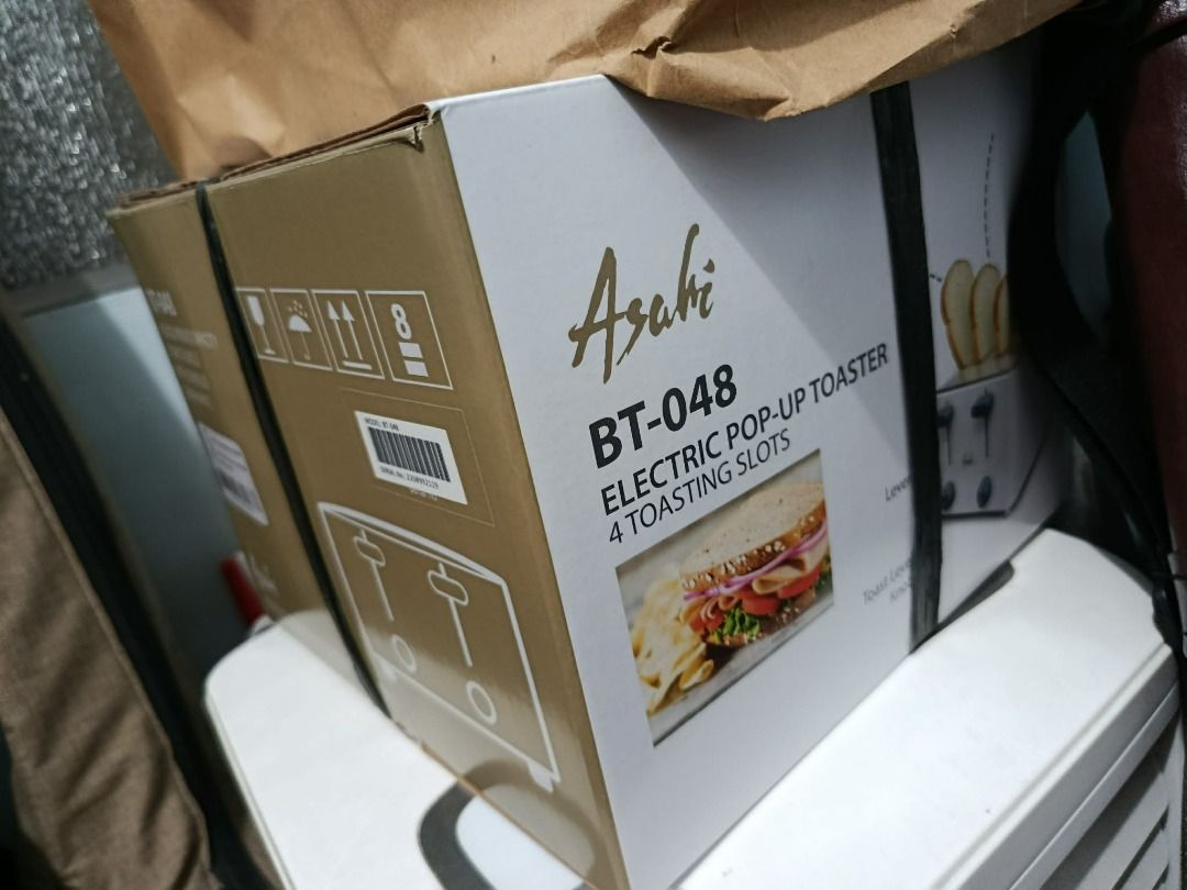 BNEW - Asahi 4-Slot Toaster (Category: Other Kitchenware & Tableware) located in Quezon City. Submitted by SweetPea17 (Listing ID 1462998894, Image 1). Description: - Brand new Asahi Electric Pop-Up Toaster - Model: BT-048 - Features 4 toasting slots - Sleek white design - Perfect for families or those who love toast.