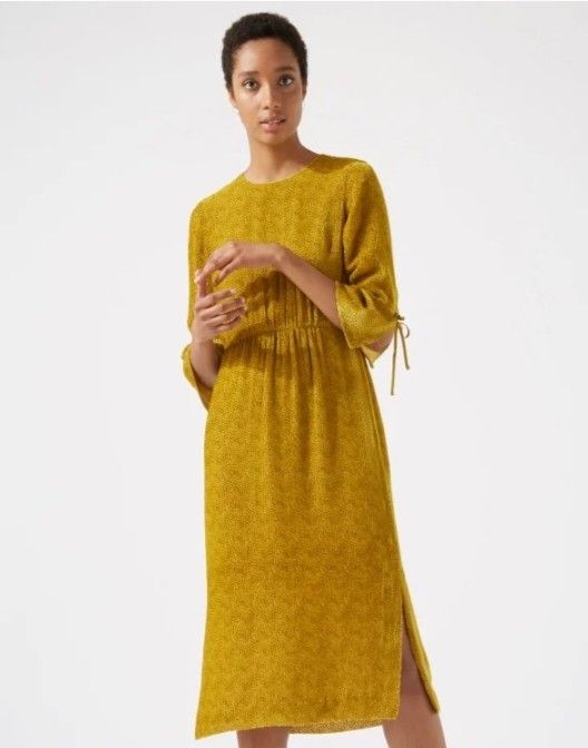 BNWT JIGSAW Velvet Spot Devore Dress (Category: Dresses) located in Cabanatuan. Submitted by miss.maia (Listing ID 1463024805, Image 1). Description: Jigsaw Velvet Spot Devore Dress. It features an opulent burnout devoré spotted pattern, a crew neckline, side splits at the hem, and distinctively flared sleeves finished with playful rouleau ties. The Fabric: The burnout devoré velvet technique used on this dress gives it a highly tactile, opulent 