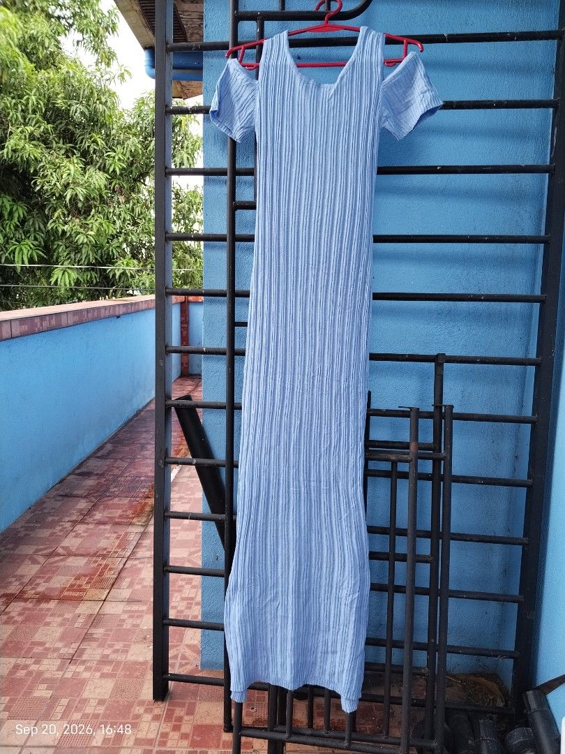 Bodycon Ribbed Cold Shoulder Maxi Dress (Category: Dresses) located in Mabalacat. Submitted by whowannashoppe (Listing ID 1462984699, Image 1). Description: - Light blue ribbed maxi dress - Stretchable fabric - Cold shoulder design with short sleeves - Round neckline ant V-cut back - Back slit at the bottom - Long, flowy style - Comfortable and stylish - Ideal for casual wear or beach vacations. - Barely used. Good as new..