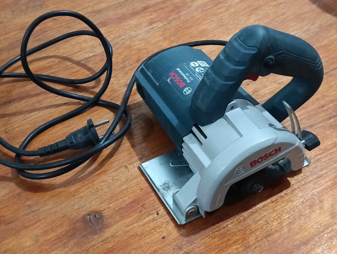 BOSCH Professional GDC 140 Marble Cutter (Category: Home Improvement Tools & Accessories) located in Quezon City. Submitted by wads_ (Listing ID 1463020611, Image 1). Description: - Bosch Professional GDC 140 Marble Cutter - Powerful 1400W motor - Operates on 220-230V - 115mm disc diameter - Maximum cutting depth of 35mm .