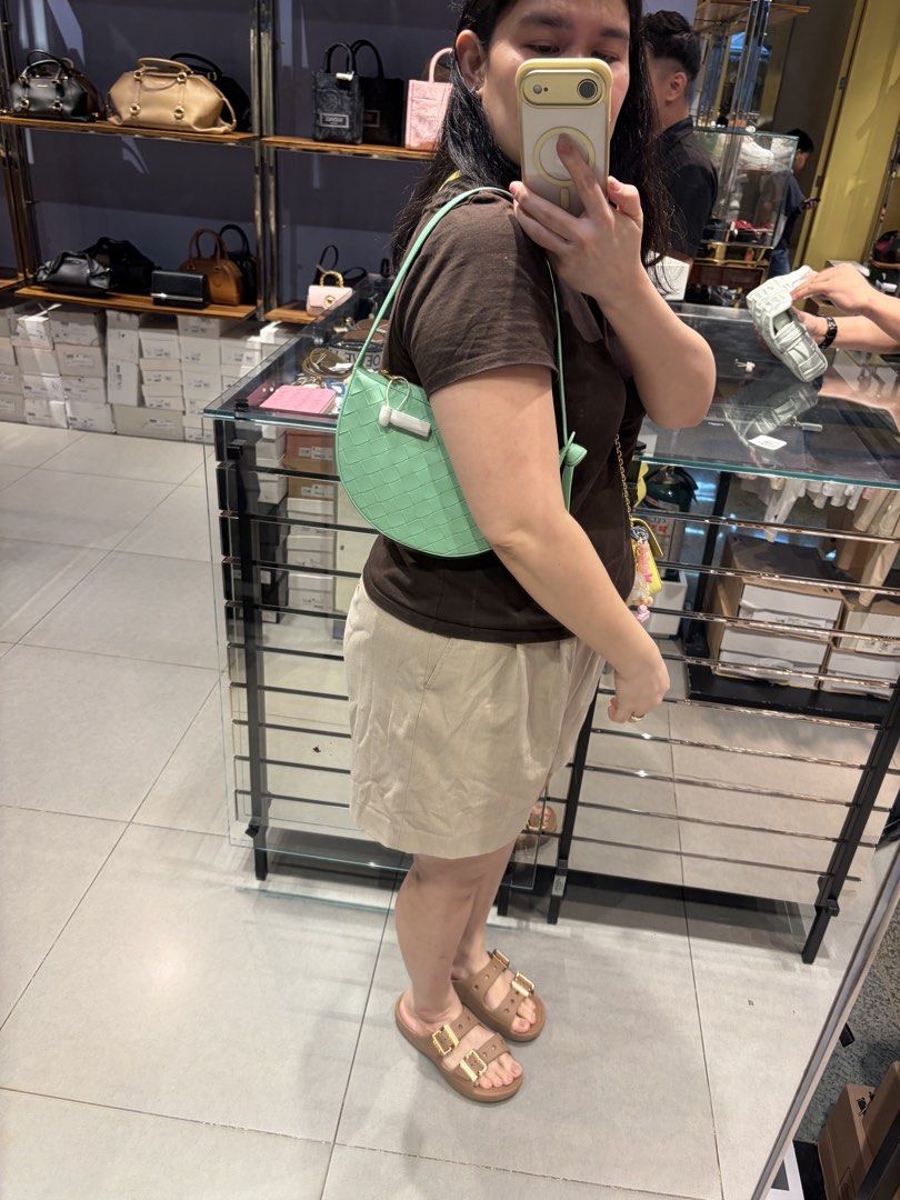 Bottega Venetta Shoulder Bag (Category: Shoulder Bags) located in Cavite. Submitted by tripleKgels (Listing ID 1463047528, Image 1). Description: - Cute mint green shoulder bag - Knot embossed texture all over - Unique curved shape - Comes with dustbag and card - Perfect for casual outings or dressing up an outfit - Fits essentials like phone, wallet, and keys.