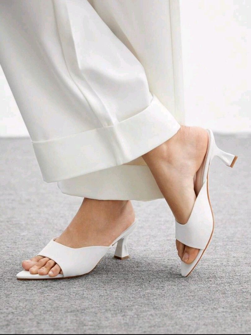 Brand New White Slip-on Heels (Category: Sandals) located in Makati City. Submitted by annsniftynook (Listing ID 1463048603, Image 2). Description: *PLEASE READ BEFORE ORDERING* ❗️All flaws (if any) are clearly disclosed in the description. No hidden issues. No surprises. 🖼 The ACTUAL PHOTO of the item is already posted. Please check it thoroughly before messaging. 📸 Photo grabbed from Shein where it was purchased from. 💯 What you see in the p