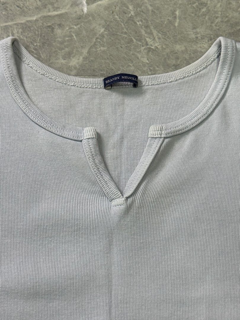 Brandy Melville Blue Ashlyn V-Notch Top (Category: Shirts) located in Trece Martires City. Submitted by pre_lovvved (Listing ID 1463044062, Image 3). Description: length: 40cm bust: 37-38cm.