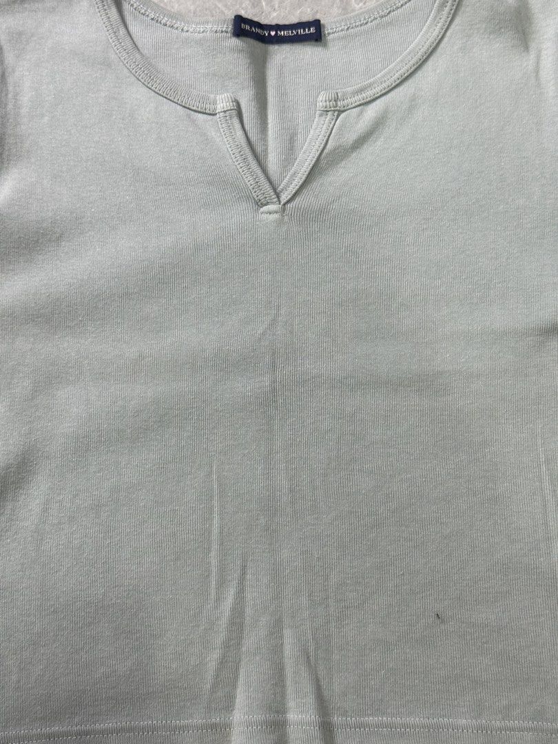 Brandy Melville Green Ashlyn V-Notch Top (Category: Shirts) located in Trece Martires City. Submitted by pre_lovvved (Listing ID 1463043231, Image 2). Description: length: 40cm bust: 37-38cm.