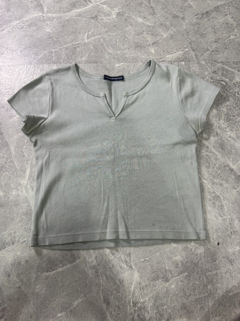 Brandy Melville Green Ashlyn V-Notch Top (Category: Shirts) located in Trece Martires City. Submitted by pre_lovvved (Listing ID 1463043231, Image 1). Description: length: 40cm bust: 37-38cm.