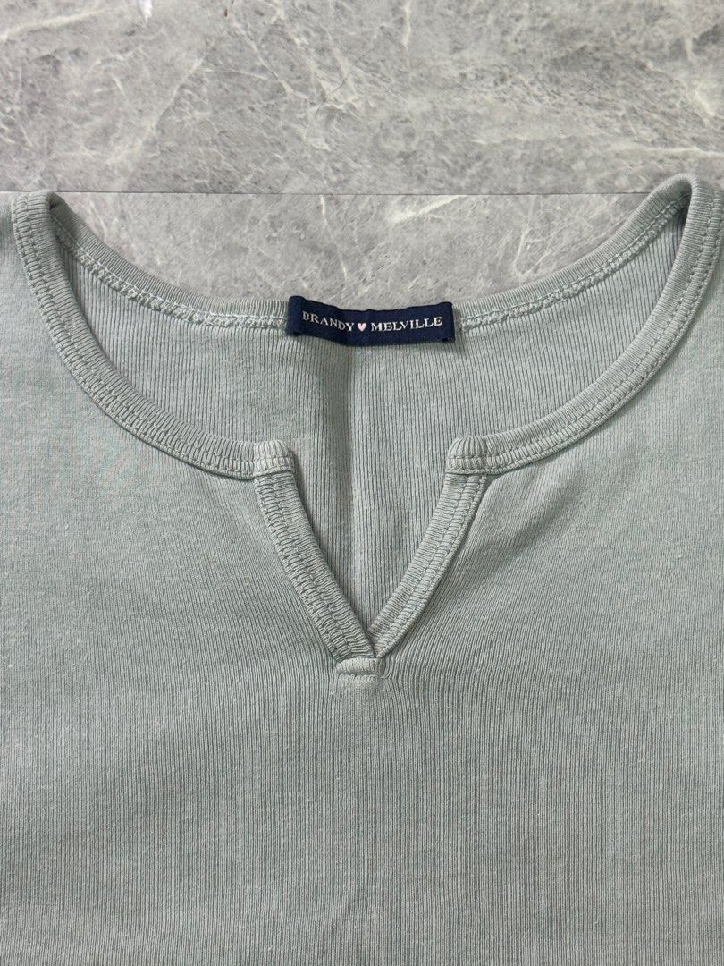 Brandy Melville Green Ashlyn V-Notch Top (Category: Shirts) located in Trece Martires City. Submitted by pre_lovvved (Listing ID 1463043231, Image 3). Description: length: 40cm bust: 37-38cm.