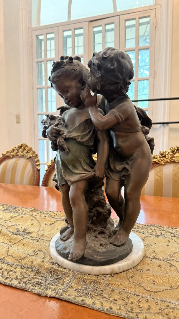 Bronze Cherub Sculpture with Marble Base (Category: Figurines & Statues) located in Cainta. Submitted by caroldy10 (Listing ID 1462955388, Image 3). Description: - Vintage bronze sculpture featuring two cherubs. - Mounted on a classic white marble base. - Adds a timeless, elegant touch to your home decor. - Perfect for display on shelves or tables. Price is slightly negotiable.