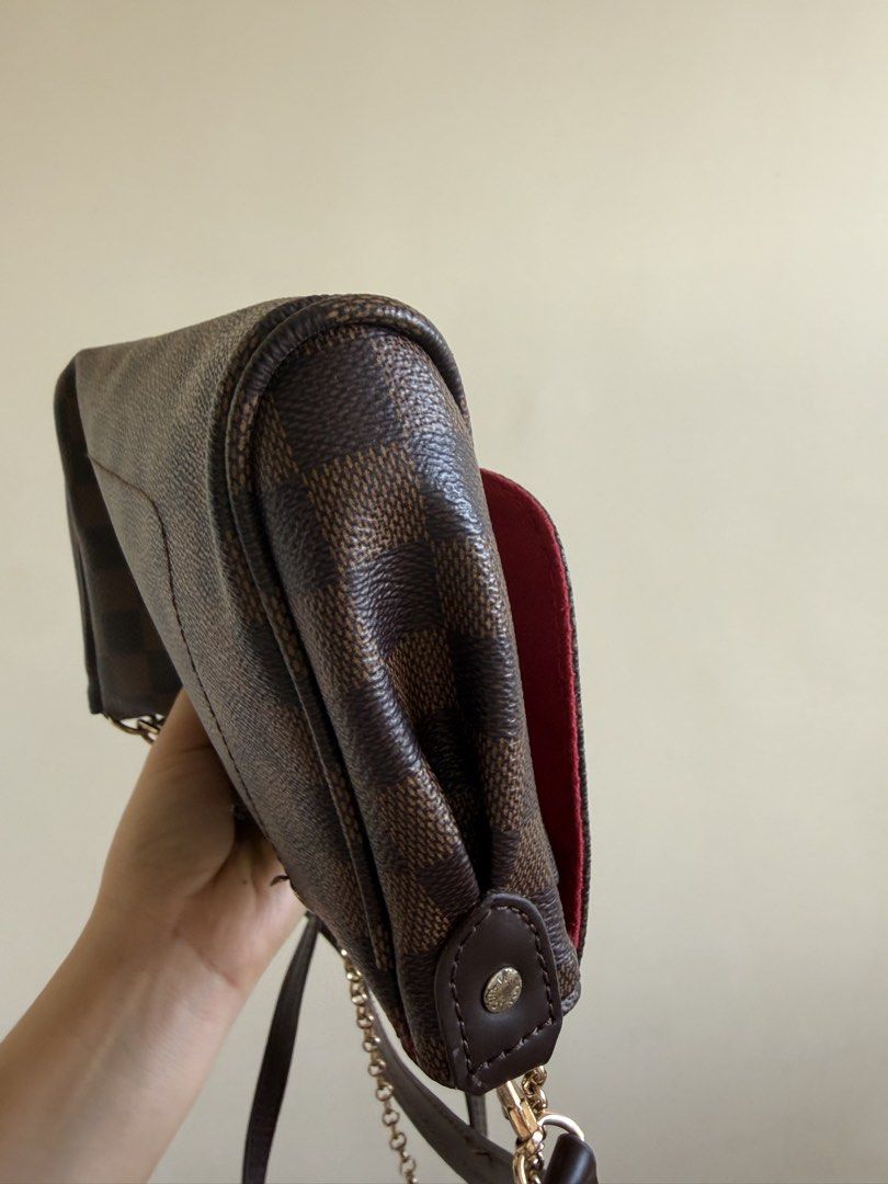 Brown Checkered Shoulder Bag with Chain Strap (Category: Shoulder Bags) located in Bacolor. Submitted by ieshaaa.1 (Listing ID 1462892686, Image 2). Description: - Brown checkered shoulder bag - Features a chain strap - Darker brown leather trim - Red interior lining - Front metal plate detail - Small and compact size - Ideal for carrying essentials.