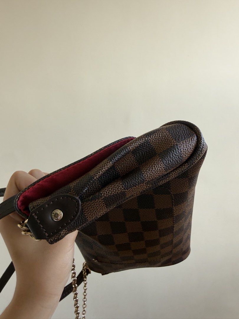Brown Checkered Shoulder Bag with Chain Strap (Category: Shoulder Bags) located in Bacolor. Submitted by ieshaaa.1 (Listing ID 1462892686, Image 3). Description: - Brown checkered shoulder bag - Features a chain strap - Darker brown leather trim - Red interior lining - Front metal plate detail - Small and compact size - Ideal for carrying essentials.