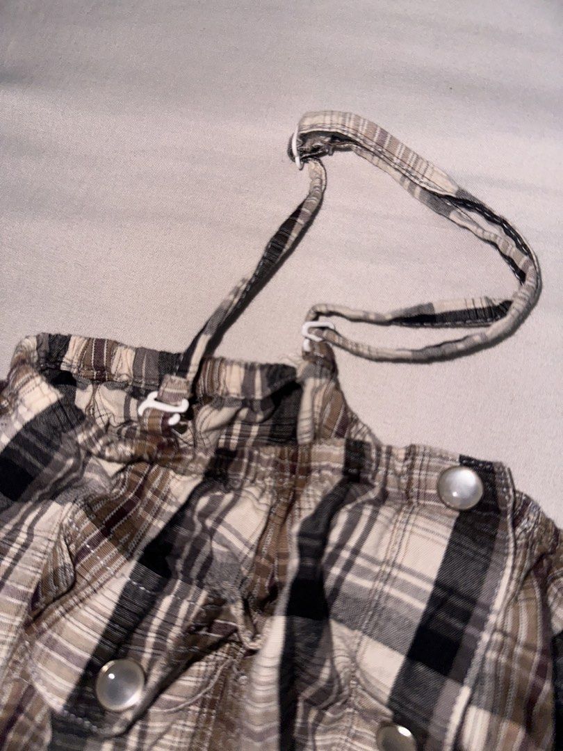 Brown Plaid Button-Up Camisole Top (Category: Sleeveless) located in Manila. Submitted by etain.xo (Listing ID 1463027710, Image 3). Description: - Cute brown plaid camisole top - Adjustable straps and removable straps - Button-up front - Elasticated waist for a flattering silhouette - Lightweight fabric, perfect for layering or wearing alone - Ideal for a casual, chic look - fits small.