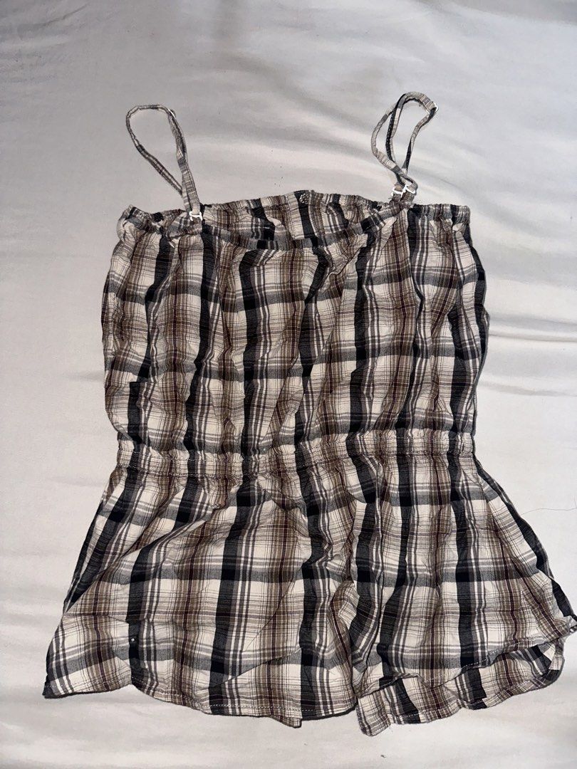 Brown Plaid Button-Up Camisole Top (Category: Sleeveless) located in Manila. Submitted by etain.xo (Listing ID 1463027710, Image 2). Description: - Cute brown plaid camisole top - Adjustable straps and removable straps - Button-up front - Elasticated waist for a flattering silhouette - Lightweight fabric, perfect for layering or wearing alone - Ideal for a casual, chic look - fits small.