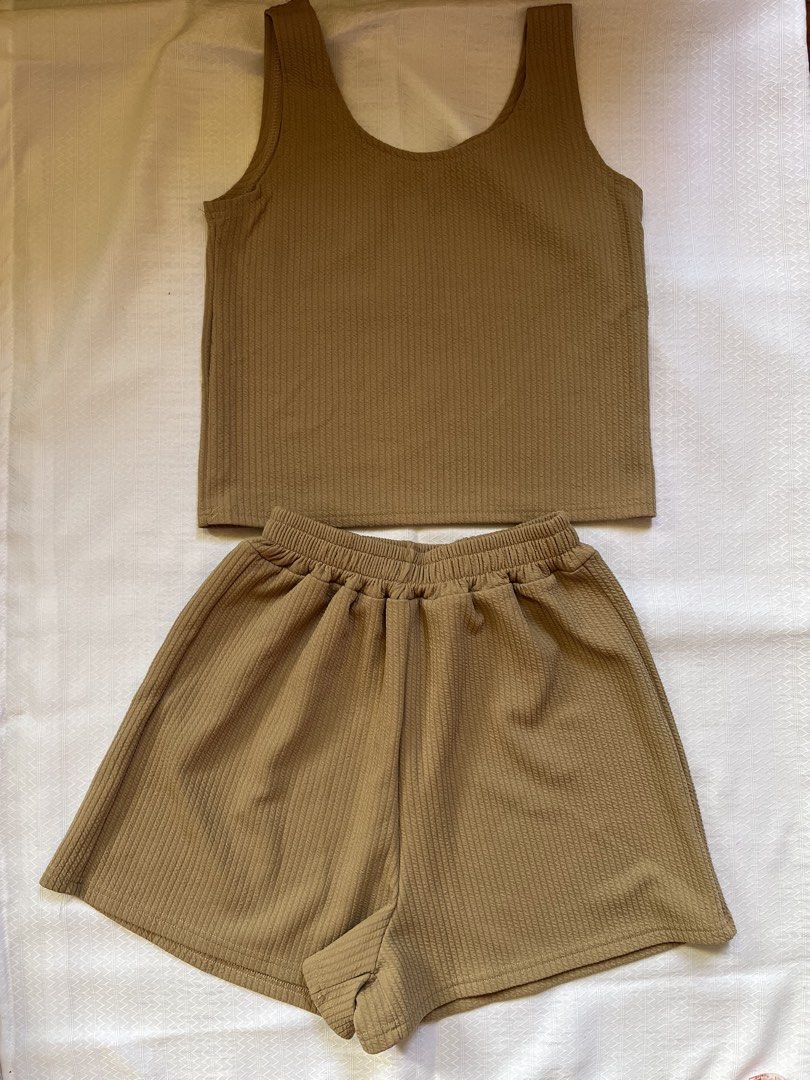 Brown Ribbed Tank top and Shorts Set (Category: Sets or Coordinates) located in Baguio. Submitted by leyfinds_2600 (Listing ID 1462918595, Image 1). Description: Light brown color Size: M–L (stretchable) Bust: 32” circumference Waist: 22”–46” circumference Please refer to measurements for best fit. 📍Baguio Shipping thru J&T (payment first) .