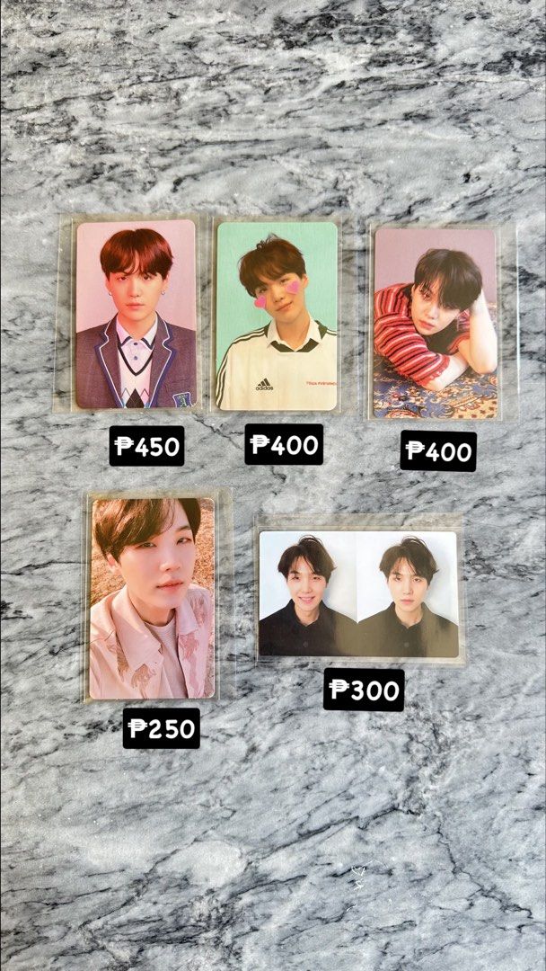BTS SUGA Photocards - Love Yourself (Category: K-Wave Merchandise) located in Batangas. Submitted by porscheanillo (Listing ID 1462919980, Image 2). Description: - Official BTS Suga photocards - All photocards are in protective sleeves - Prices: - Top Left: P450 - Top Middle: P400 - SOLD - Top Right: P400 - Bottom Left: P250 - Bottom Right (Double PC): P300 - DM for bundle deals or any questions!.
