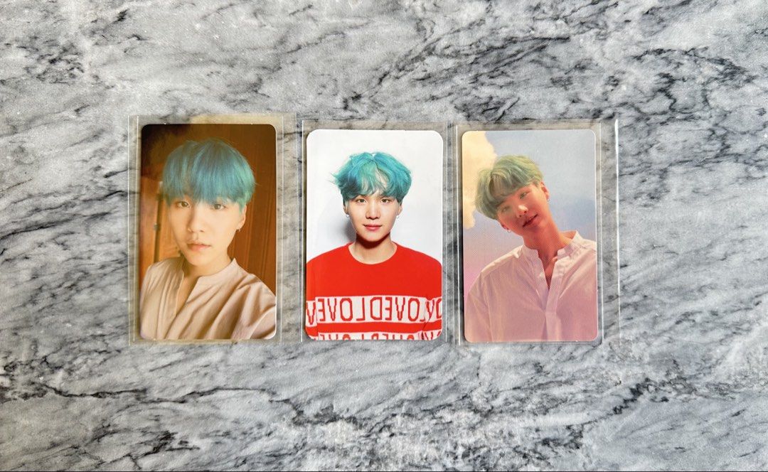 BTS Suga Photocards Love Yourself (Category: K-Wave Merchandise) located in Batangas. Submitted by porscheanillo (Listing ID 1462919766, Image 3). Description: - Official BTS Suga Photocards - All photocards are in protective sleeves - Photocard 1: P450 - Photocard 2 (Suga in red shirt): P700 - Photocard 3: P800 - Ideal for any ARMY's collection - DM for inquiries or bundle deals.