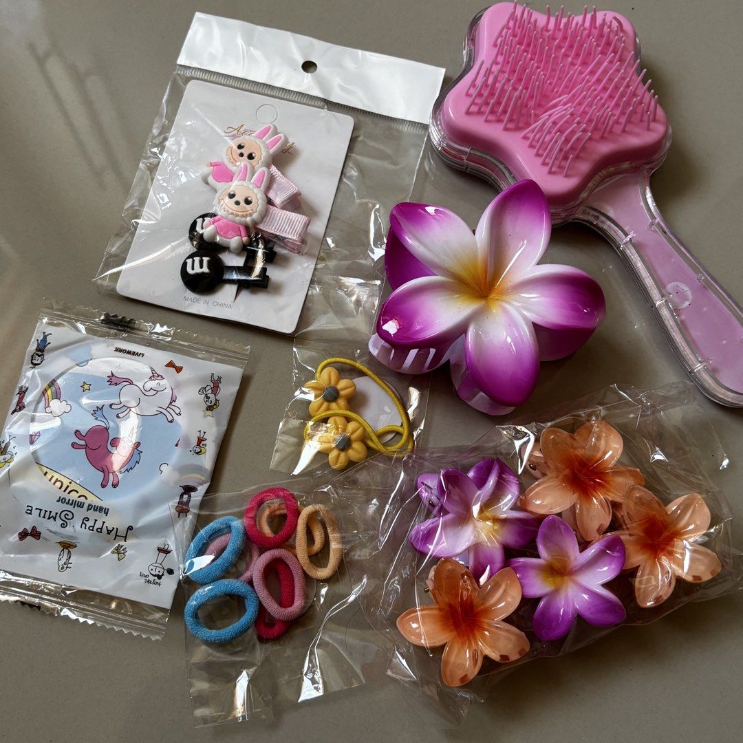 bundle set 6 (Category: Charms) located in Manila. Submitted by lavieelle (Listing ID 1462940550, Image 2). Description: - on sale for 100 pesos ‼️ - all items are bought at SM - brand new, no flaws - consists of hair brush, compact mirror, hair clip and set of pony tails - rfs: decluttering .