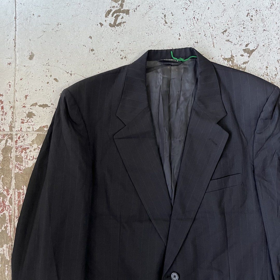 BURBERRY dark gray or black two-button suit jacket with a subtle textured stripe pattern and notched lapels. (Category: Coats, Jackets and Outerwear) located in Iloilo. Submitted by plugsta (Listing ID 1462991606, Image 3). Description: BURBERRY SIZE: M MEASUREMENTS LAID FLAT (IN INCHES): WIDTH: 22 LENGTH: 31 SLEEVE LENGTH: 24 SS: 19 CONDITION: 9/10 FLAW/S: NECKPART .