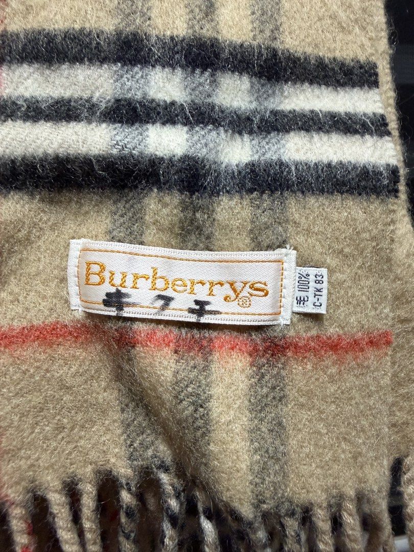 Burberry Nova Check Scarf (Category: Scarves) located in Tarlac. Submitted by rizasdeclutteringonline (Listing ID 1462927524, Image 2). Description: - Authentic Burberry scarf - Iconic nova check pattern - Features fringe on both ends - Adds warmth and style to any outfit -may discoloration sya pero di naman halata kapag gamit kasi nagbleblend sa color nya. -50 inches yun haba hindi pa kasama yun prang sa baba na tali tali -100% wool -I bought th