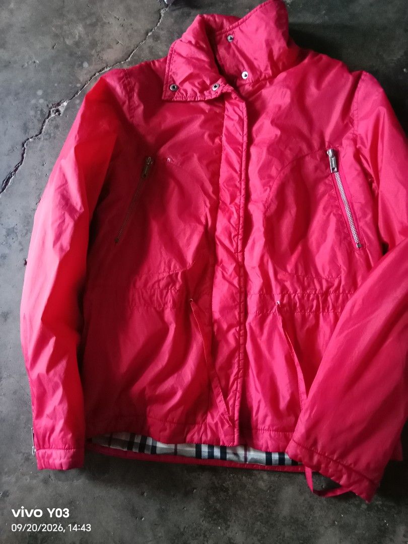 Burberry Pink Lightweight Jacket (Category: Coats, Jackets and Outerwear) located in Cabuyao City. Submitted by blake657 (Listing ID 1462963084, Image 1). Description: - Lightweight pink Burberry jacket - Ideal for layering - Adjustable drawstring waist for a custom fit - Convenient zip pockets on the front - Lined with iconic Burberry check pattern - A versatile and stylish wardrobe essential.
