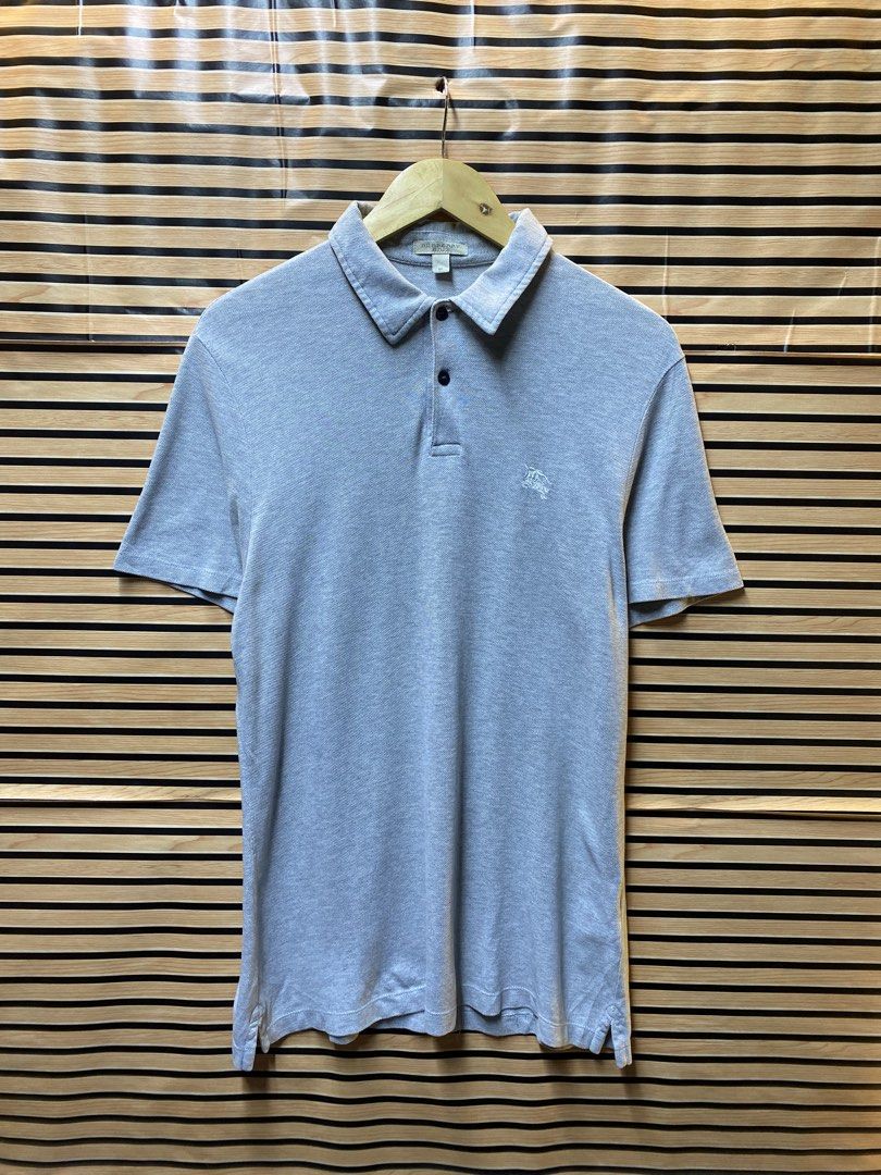BURBERRY POLO SHIRT (Category: Tshirts & Polo Shirts ) located in Makati City. Submitted by drip.poww (Listing ID 1462955728, Image 1). Description: - Authentic Burberry - Color: Gray - Size: Large - Dimes: 22x30 - Authentic - Excellent condition - Need wash, fresh from bale - Material: 100% Cotton Please don’t expect too much—these are thrifted (ukay) items. 😊 !!STILL NEGOTIABLE!!.