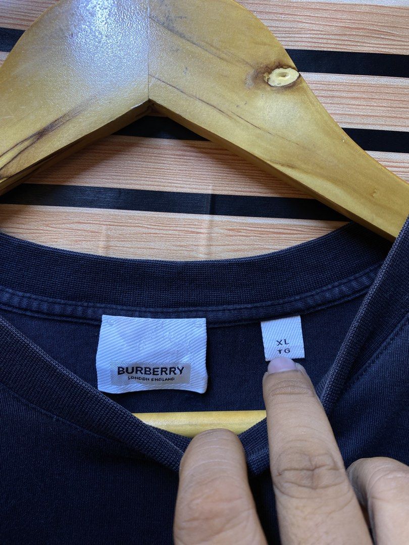 BURBERRY “SCRIPT” TEE (Category: Tshirts & Polo Shirts ) located in Makati City. Submitted by drip.poww (Listing ID 1462941793, Image 3). Description: - Authentic Burberry - Color: Black - Size: Large - Dimes: 23x27 - Authentic - Excellent condition - Need wash, fresh from bale - Material: 100% Cotton Please don’t expect too much—these are thrifted (ukay) items. 😊 !!STILL NEGOTIABLE!!.