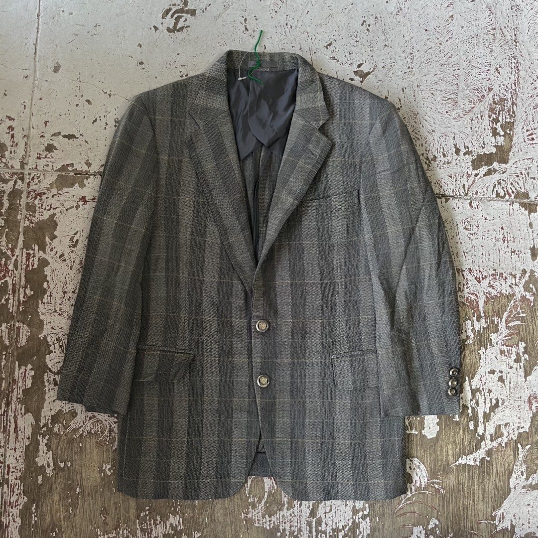 BURBERRYS gray two-button blazer featuring a subtle vertical plaid pattern. (Category: Coats, Jackets and Outerwear) located in Iloilo. Submitted by plugsta (Listing ID 1462993596, Image 1). Description: BURBERRY SIZE: M MEASUREMENTS LAID FLAT (IN INCHES): WIDTH: 20 LENGTH: 28 SLEEVE LENGTH: 20.5 SS: 17 CONDITION: EXCELLENT FLAW/S: NONE.