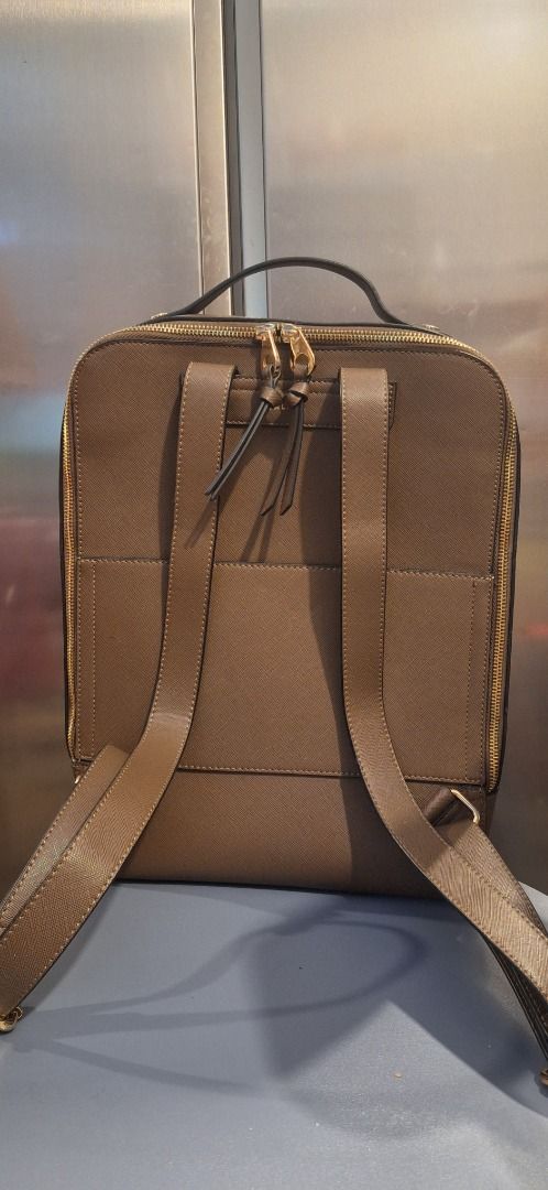 CALPAK Office Laptop Bag (Category: Backpacks) located in General Trias. Submitted by aeunice (Listing ID 1463040234, Image 3). Description: Brand: CALPAK Size: L In Good Condition. Imported. Perfect for daily use, work, or travel. Fits a laptop and provides excellent protection for your laptop and other gadgets. Made from high-quality leather with a durable, substantial feel and weight. Stylish, practical and built to last. Meet up / Shipping vi