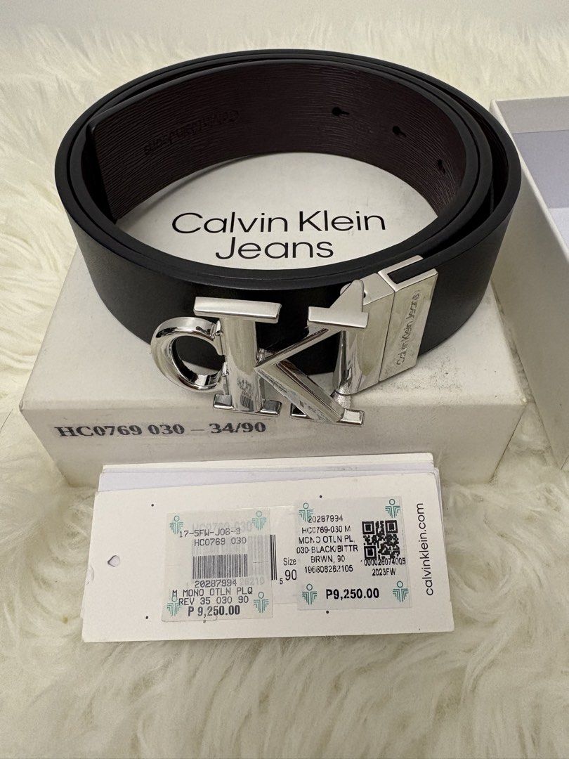 Calvin Klein Jeans CK Logo Reversible Belt (Category: Belts) located in Quezon City. Submitted by AAAAAF14 (Listing ID 1463085249, Image 2). Description: used few time - Authentic Calvin Klein Jeans belt - Iconic CK logo buckle - Reversible: Black on one side, Brown on the other - Size: 34/90 - Includes original box and tags - Versatile accessory to elevate any outfit.