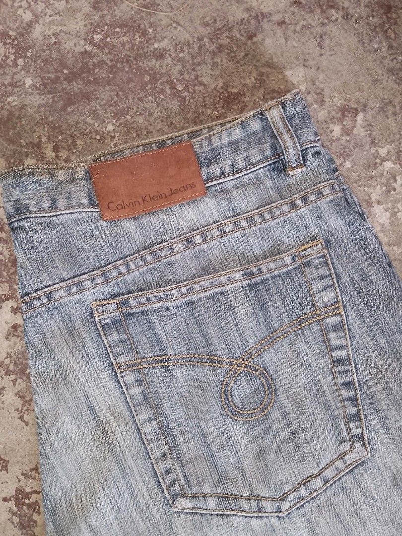 Calvin Klein Jeans Light Wash Denim (Category: Jeans) located in Manila. Submitted by ownian (Listing ID 1462898417, Image 1). Description: - Brand: Calvin Klein - Style: Classic five-pocket jeans - Wash: Light wash with a slightly faded look - Details: Leather brand patch at back waistband - Occasion: Ideal for casual wear.
