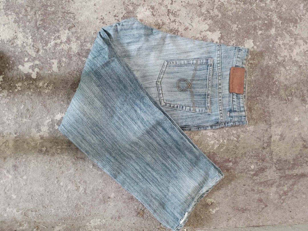 Calvin Klein Jeans Light Wash Denim (Category: Jeans) located in Manila. Submitted by ownian (Listing ID 1462898417, Image 2). Description: - Brand: Calvin Klein - Style: Classic five-pocket jeans - Wash: Light wash with a slightly faded look - Details: Leather brand patch at back waistband - Occasion: Ideal for casual wear.