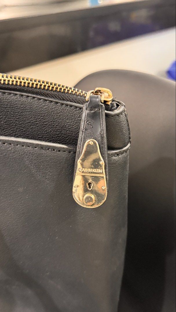 Calvin Klein Medium Dome Leather Tote Bag (Category: Tote Bags) located in Makati City. Submitted by forg3d_paradox (Listing ID 1462999909, Image 2). Description: 🌟 Preloved with no Major Defects but shows signs of usage. 🌟classic and minimalist tote bag made with faux leather material and gold hardware. 🌟 with flat double, non-adjustable top shoulder handles. 🌟 good for school and office use. It can fit a 13-inch laptop. .