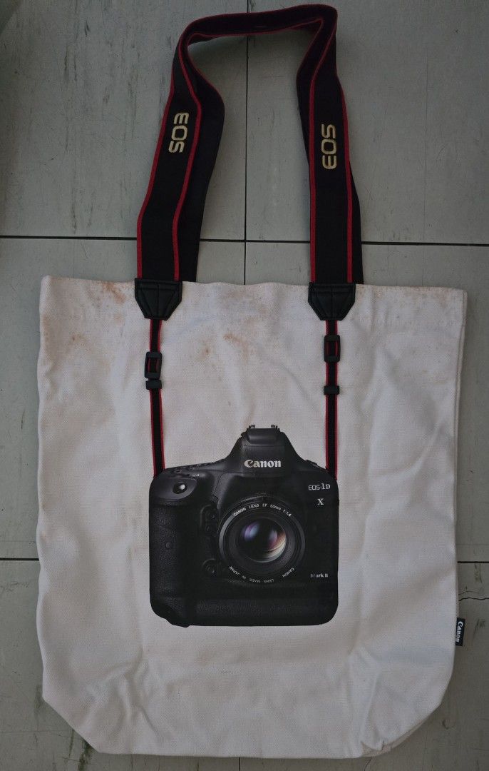 Canon EOS-1DX Mark II Tote Bag with Strap (Category: Tote Bags) located in Quezon City. Submitted by zenstar_6fc3ef (Listing ID 1462885801, Image 2). Description: *** With Visible Stains *** *** NO WARRANTY *** *** NO RETURN/NO REFUND *** Payment via Gcash only Delivery via Lalamove or Grab to be booked and shouldered by the buyer. Metro Manila area only. No swapping, please. Thanks.