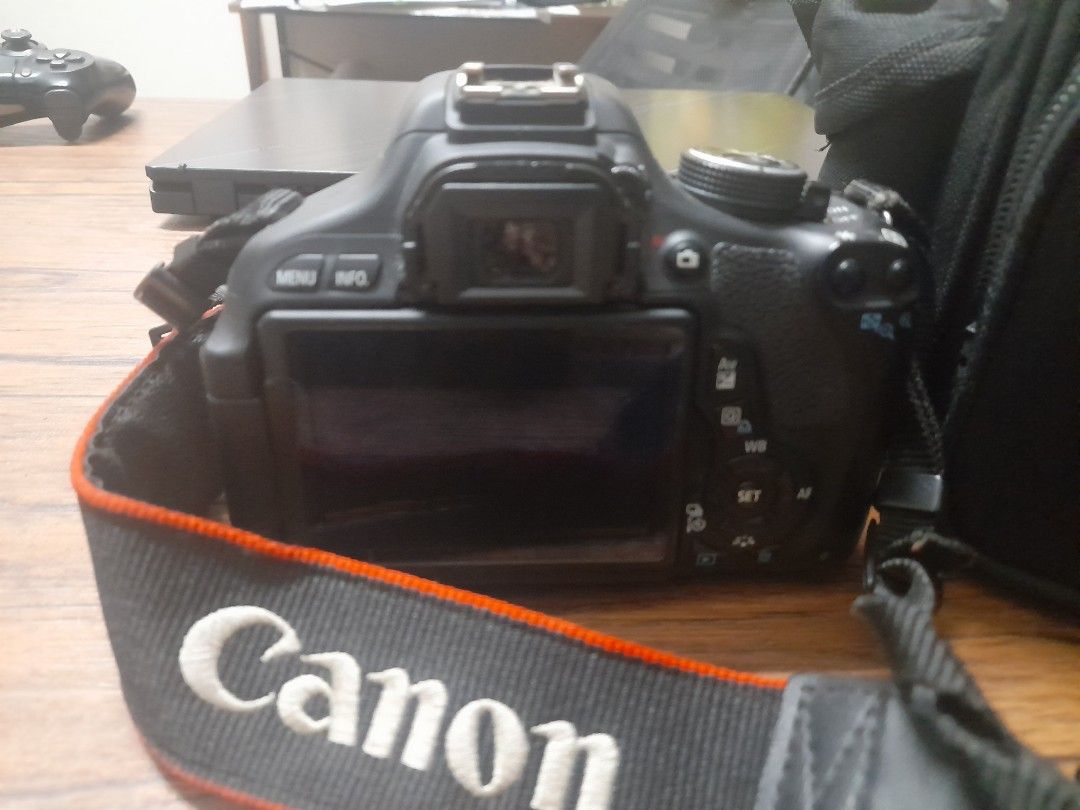 Canon EOS Kiss X5 (Category: Cameras) located in Manila. Submitted by lakenobi (Listing ID 1462989421, Image 3). Description: Working and operable camera with no change in pictures. But LCD screen needs to be repaired. INCLUSIONS: Canon camera bag Canon kit lens 18-55mm Battery and charger 4GB SD card Micro USB cable.