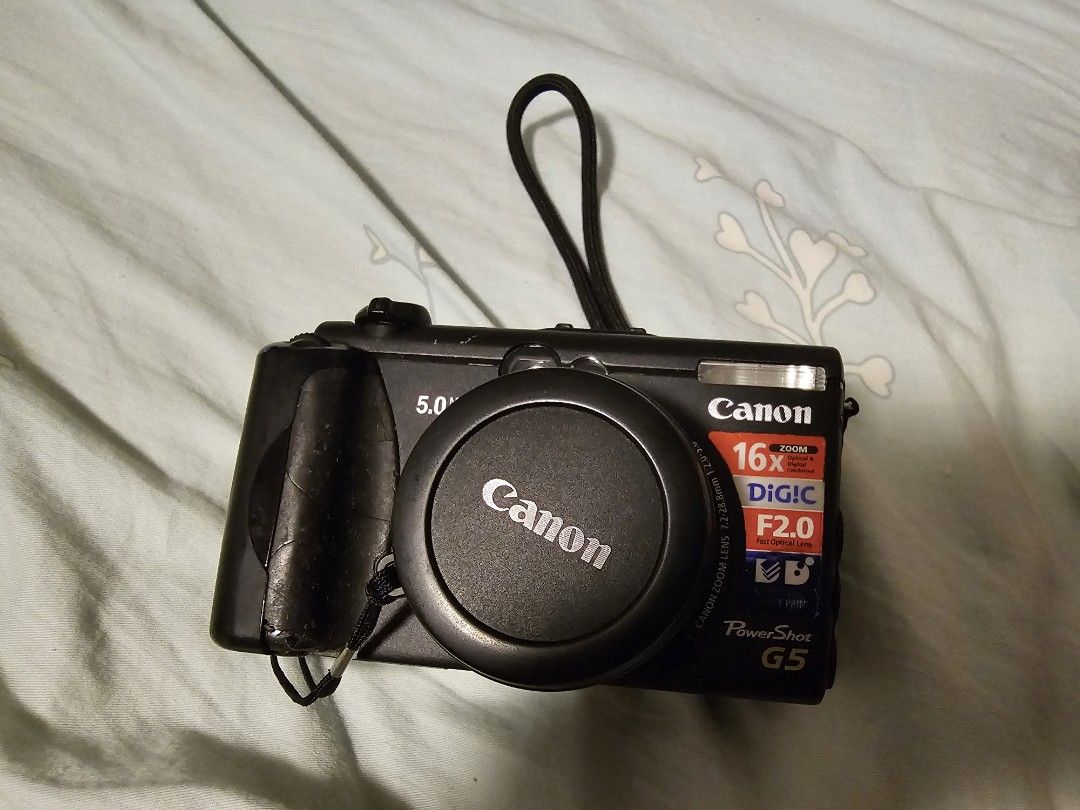 Canon PowerShot G5 數碼相機 （分類：相機）位於 Hong Kong。 由 mw_1234 提交（商品編號 1463022061，圖片 1）。簡介： Canon PowerShot G5 數碼相機，16x 光學變焦。有旋轉屏幕，方便影相。機身有正常使用痕跡，但操作正常。送相機帶。。