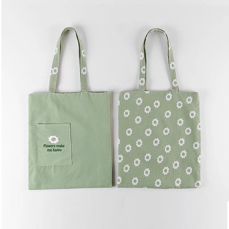 Canvas Tote Bags - Various Designs (Category: Tote Bags) located in Caba. Submitted by AdventurePlay (Listing ID 1463033003, Image 3). Description: - Cute canvas tote bags - Available colors/patterns: Solid light blue, pink with flowers, sage green with flowers, yellow, geometric pattern - Ideal for everyday use, shopping, or carrying essentials - Durable and stylish design.