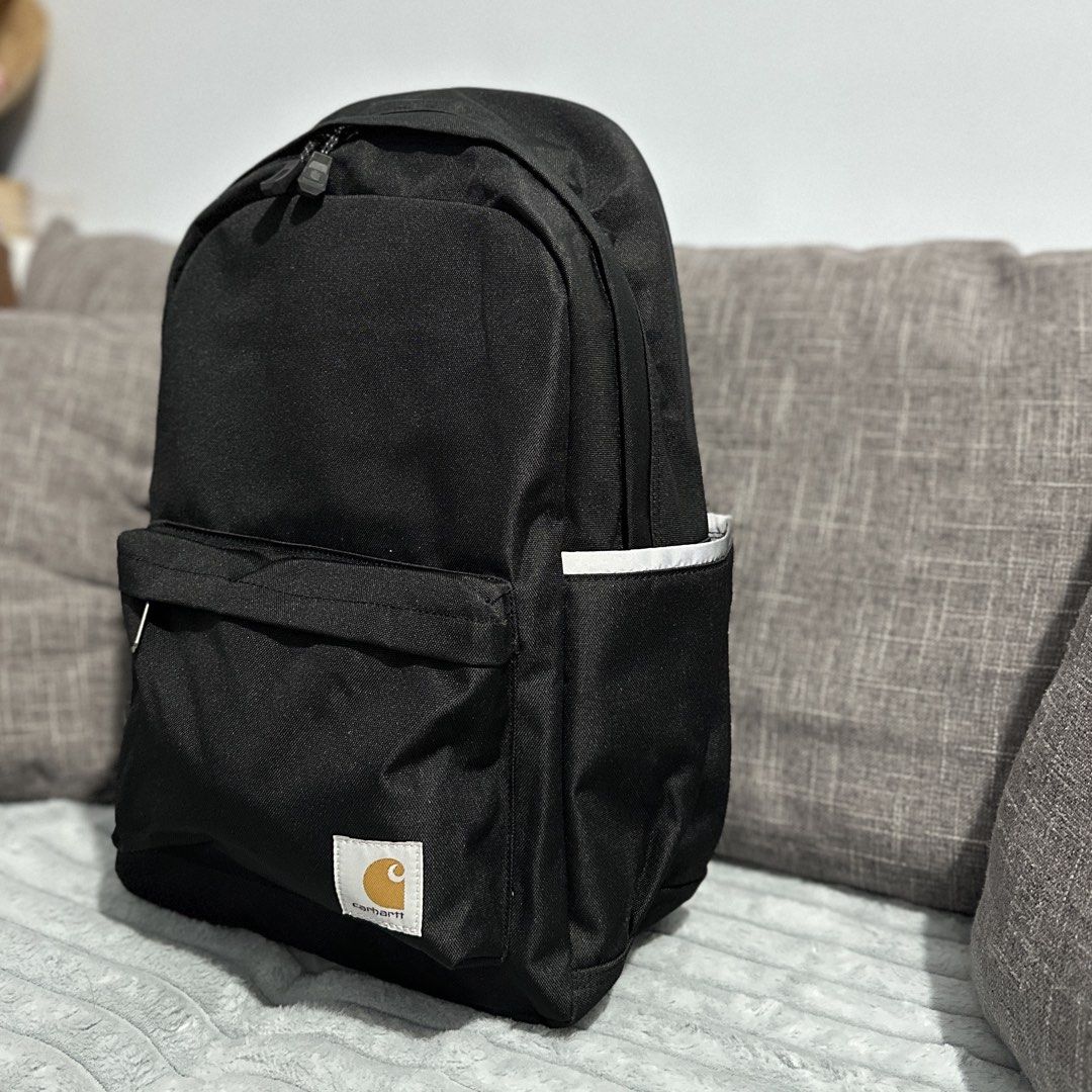 Carhartt Black Backpack (Category: Backpacks) located in Agdangan. Submitted by kiiiiingg (Listing ID 1463080348, Image 2). Description: - Classic black Carhartt backpack - Durable material, great for everyday use - Front zip pocket and side pockets for organization - Padded straps for maximum comfort - Zippers feature the iconic Carhartt logo - Simple, functional, and built to last.