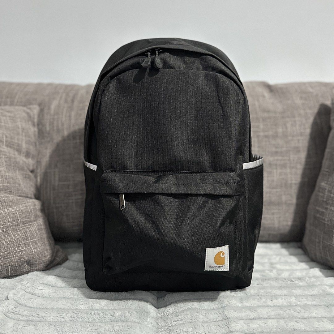 Carhartt Black Backpack (Category: Backpacks) located in Agdangan. Submitted by kiiiiingg (Listing ID 1463080348, Image 1). Description: - Classic black Carhartt backpack - Durable material, great for everyday use - Front zip pocket and side pockets for organization - Padded straps for maximum comfort - Zippers feature the iconic Carhartt logo - Simple, functional, and built to last.