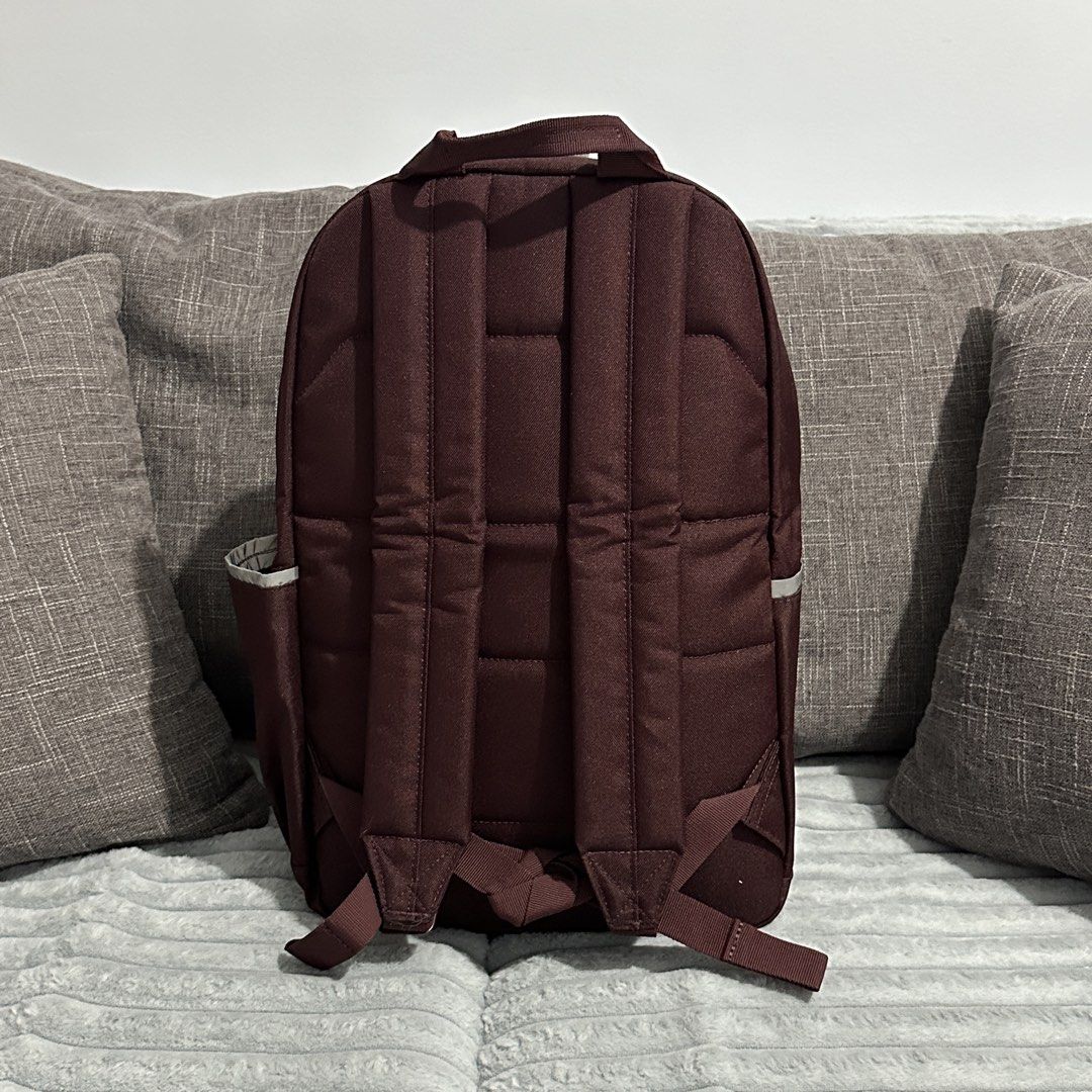 Carhartt CB0553 21L Classic Backpack - Maroon (Category: Backpacks) located in Agdangan. Submitted by kiiiiingg (Listing ID 1463080427, Image 2). Description: - Carhartt 21L Classic Backpack - Color: Maroon - Material: Durable 600-denier fabric, water repellent - Main compartment fits up to a 15-inch laptop - Front zippered compartment with elastic strap - Reflective piping on the sides for visibility - Side pockets for water bottles - Built for 